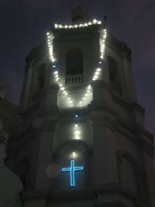 rosary hanging on a church